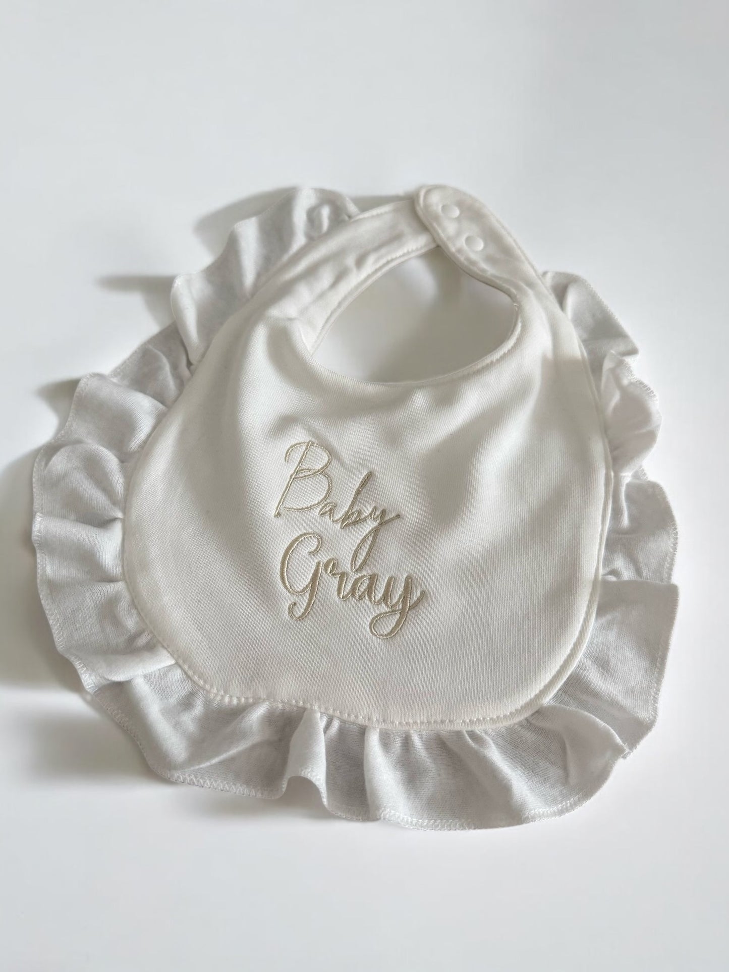 Personalised frill baby bib