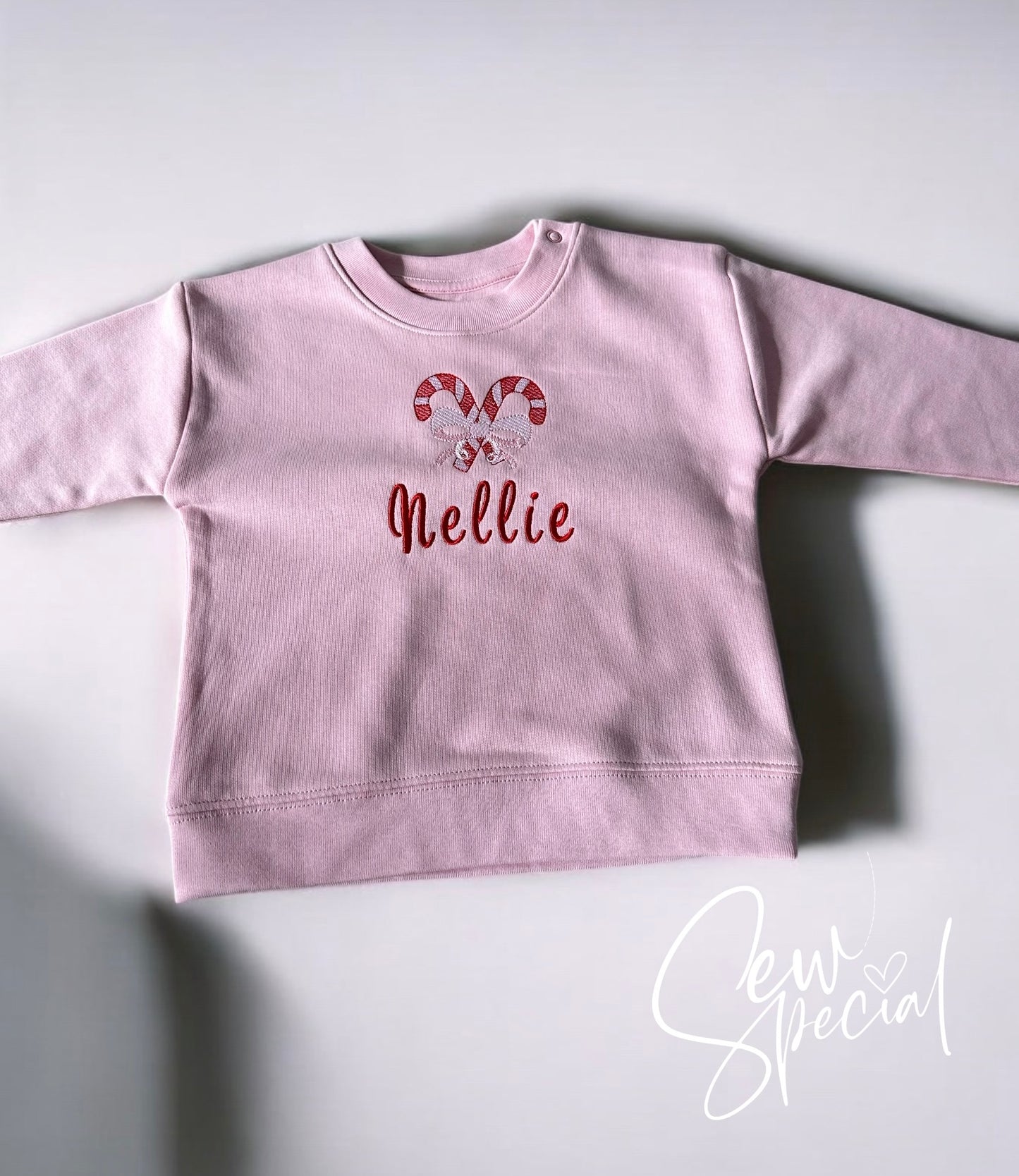 Girls personalised pink Christmas jumper