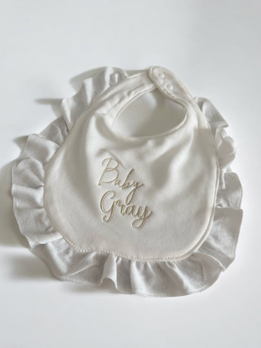 Personalised frill baby bib